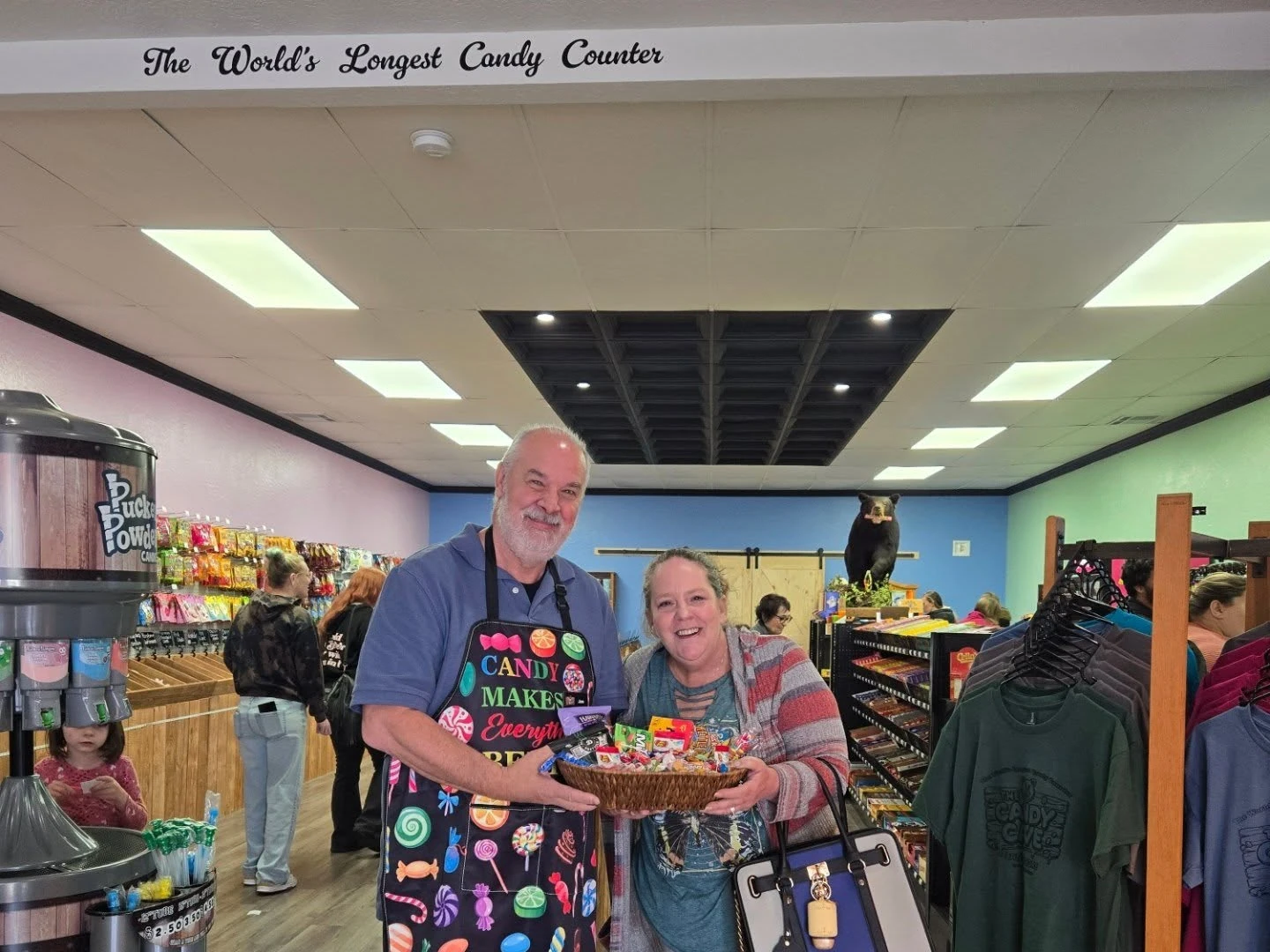 Customers standing in front of The Candy Cave counter